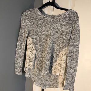 Grey sweater with crochet details